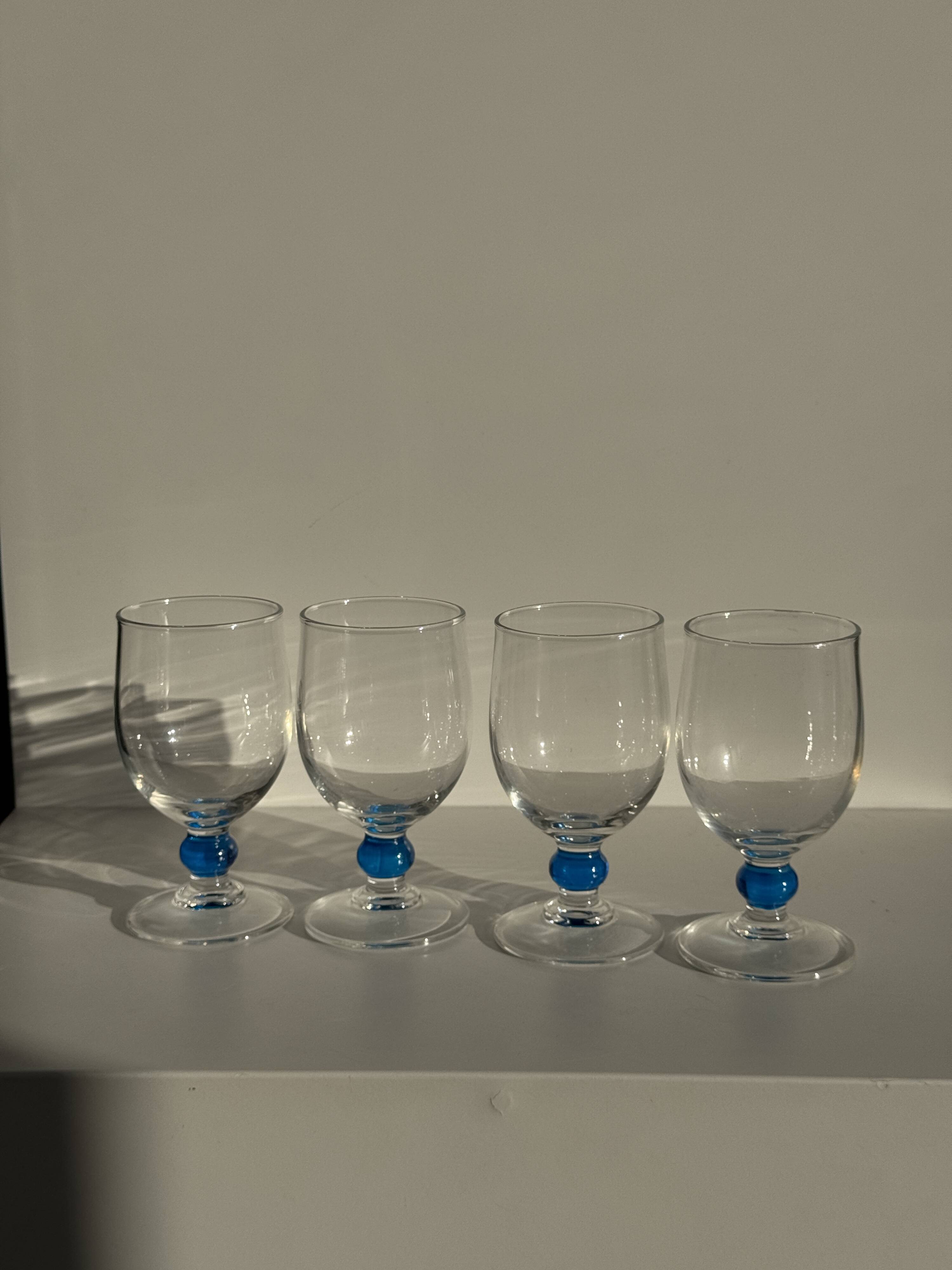 Set of 4 blue ball stemmed water glasses