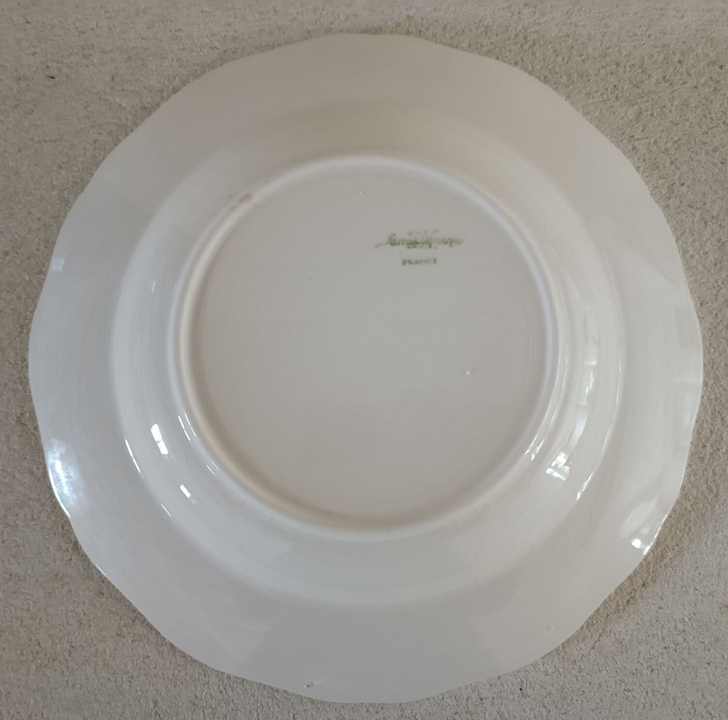 Set of 8 Sarreguemines ivory plates