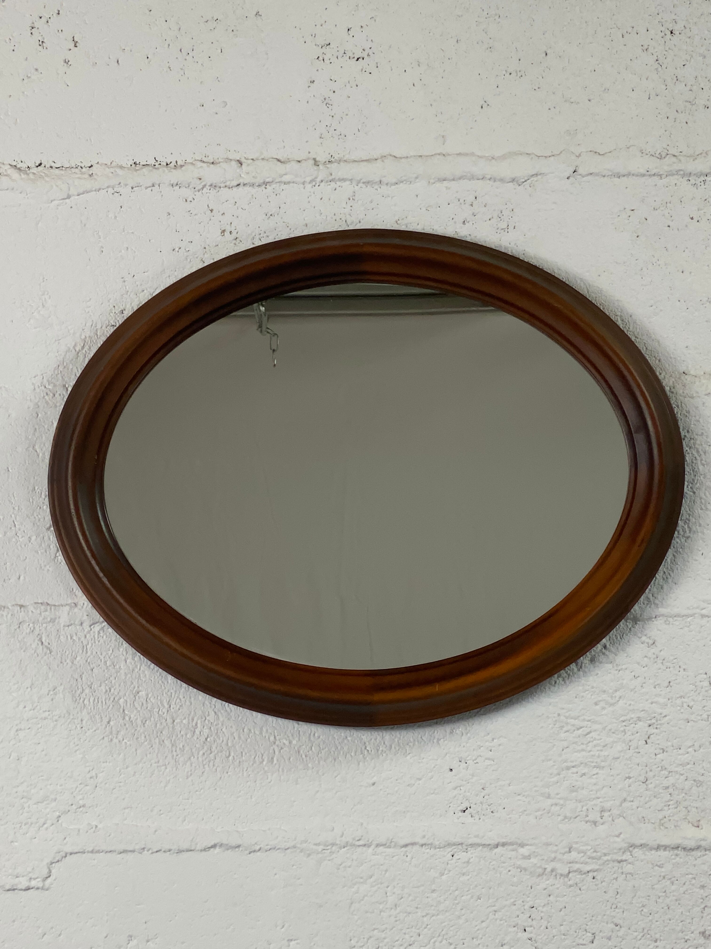 Oval wooden mirror
