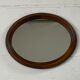 Oval wooden mirror