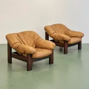 Pair of brutalist leather lounge chairs, 1960s