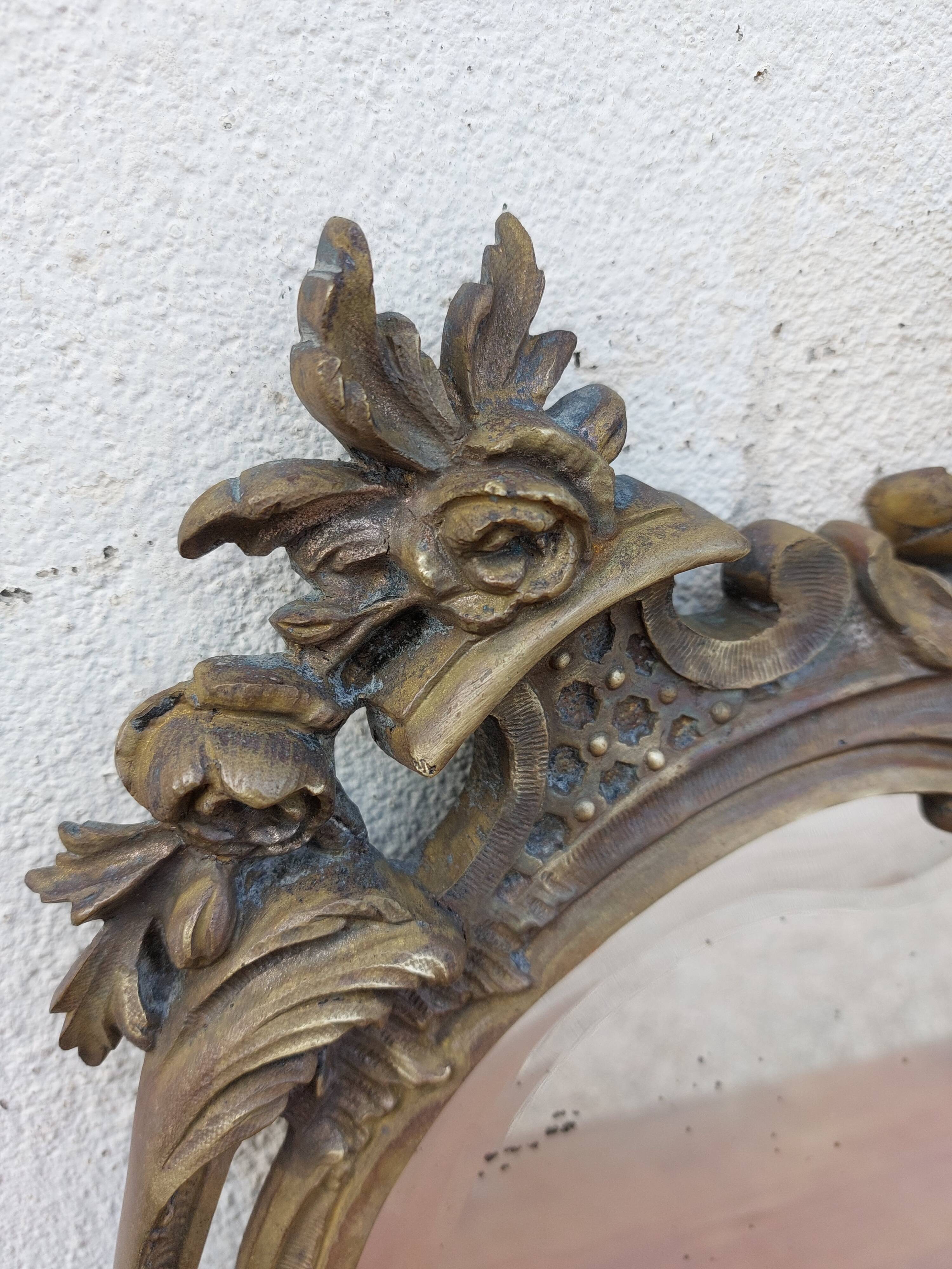 Miroir biseauté en bronze Louis XV 19ème