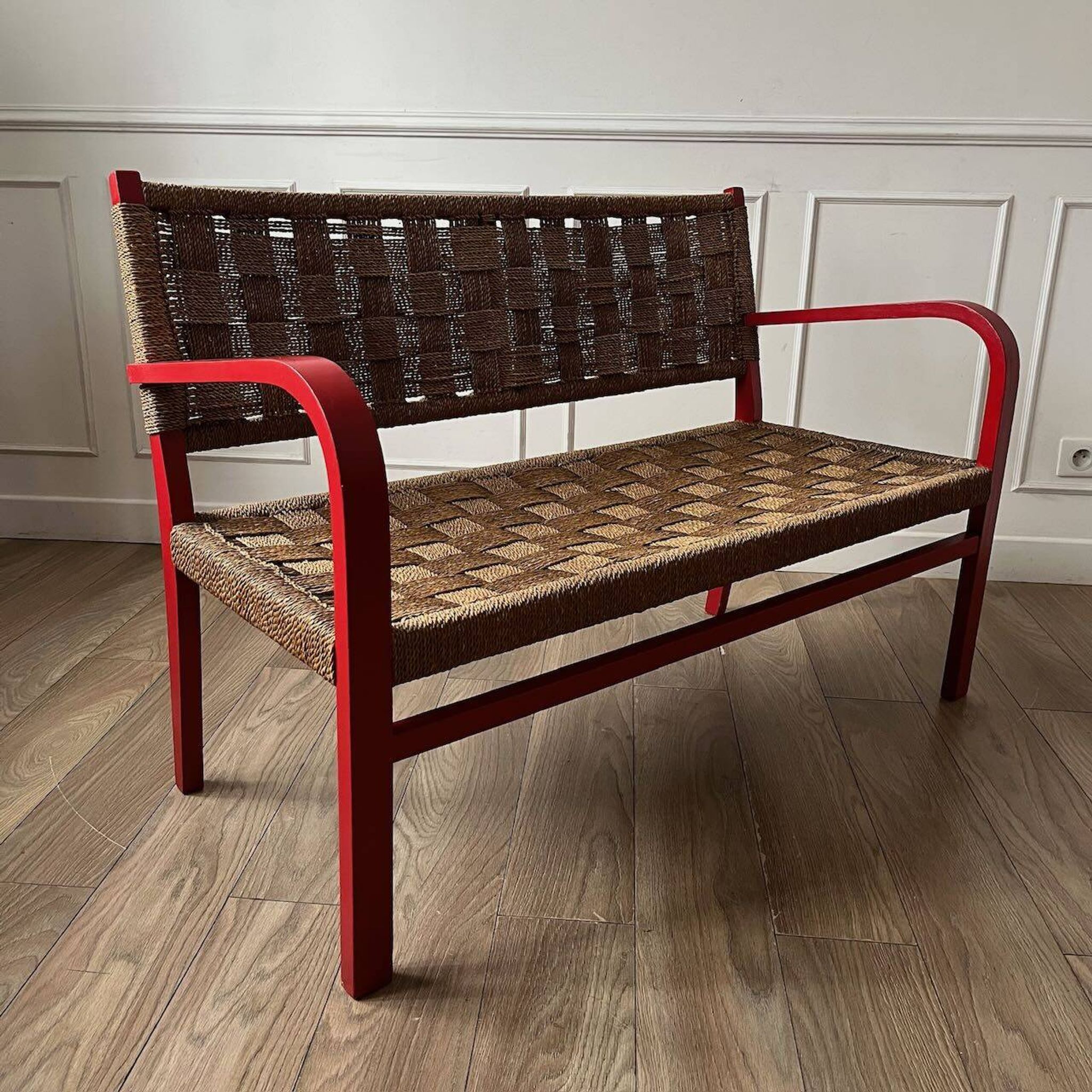 Vintage bench in red wood and rope