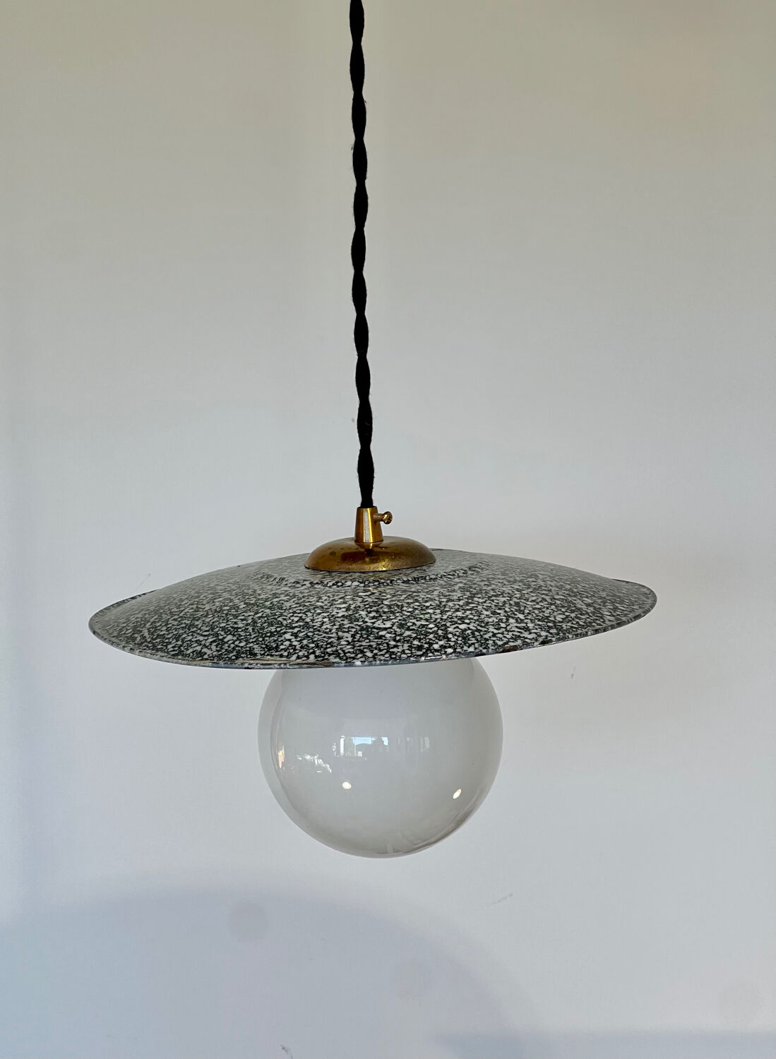 Industrial pendant light made of speckled enameled sheet metal and opaline