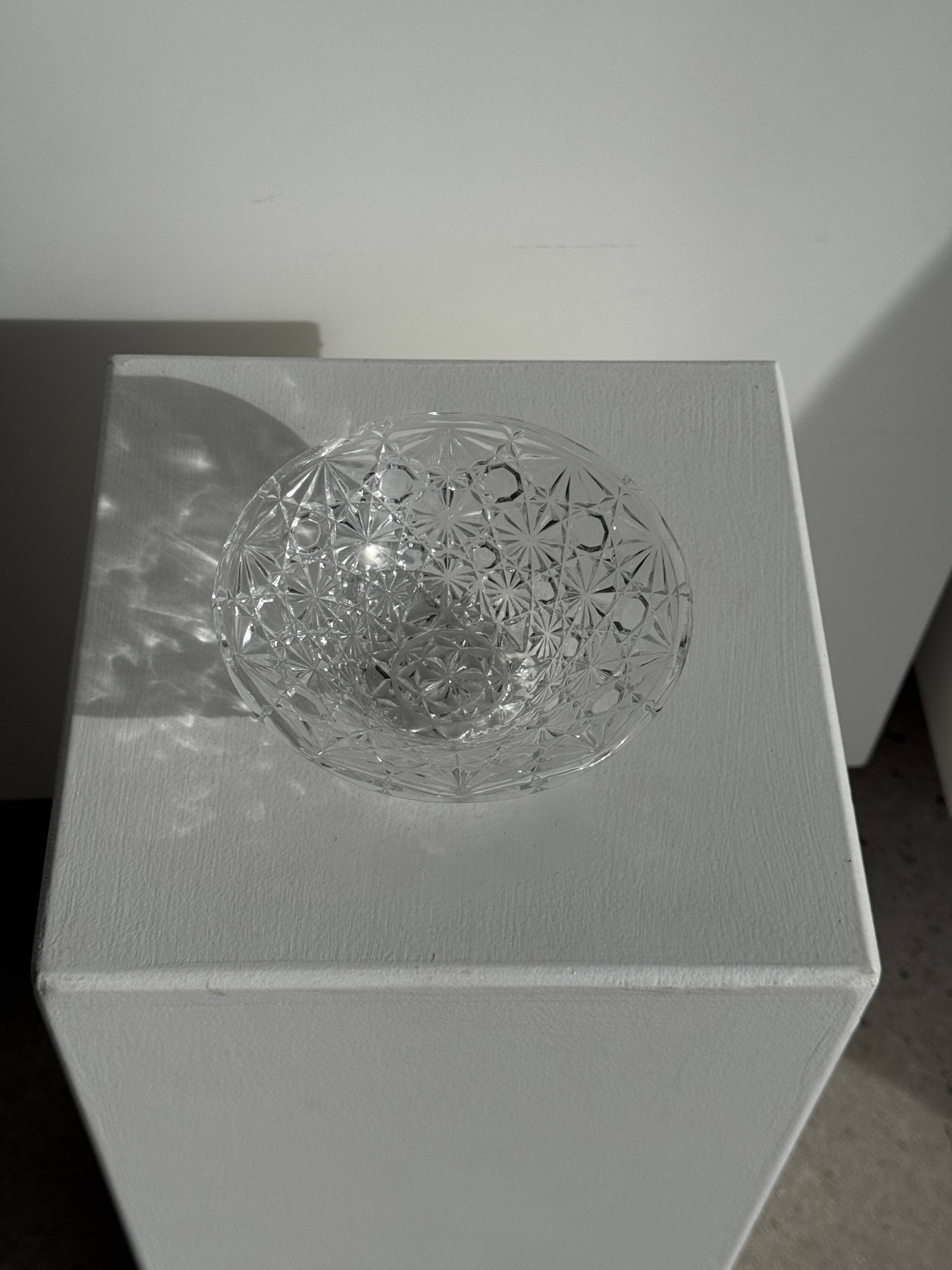 Small glass dish with vintage diamond points, a sparkle.