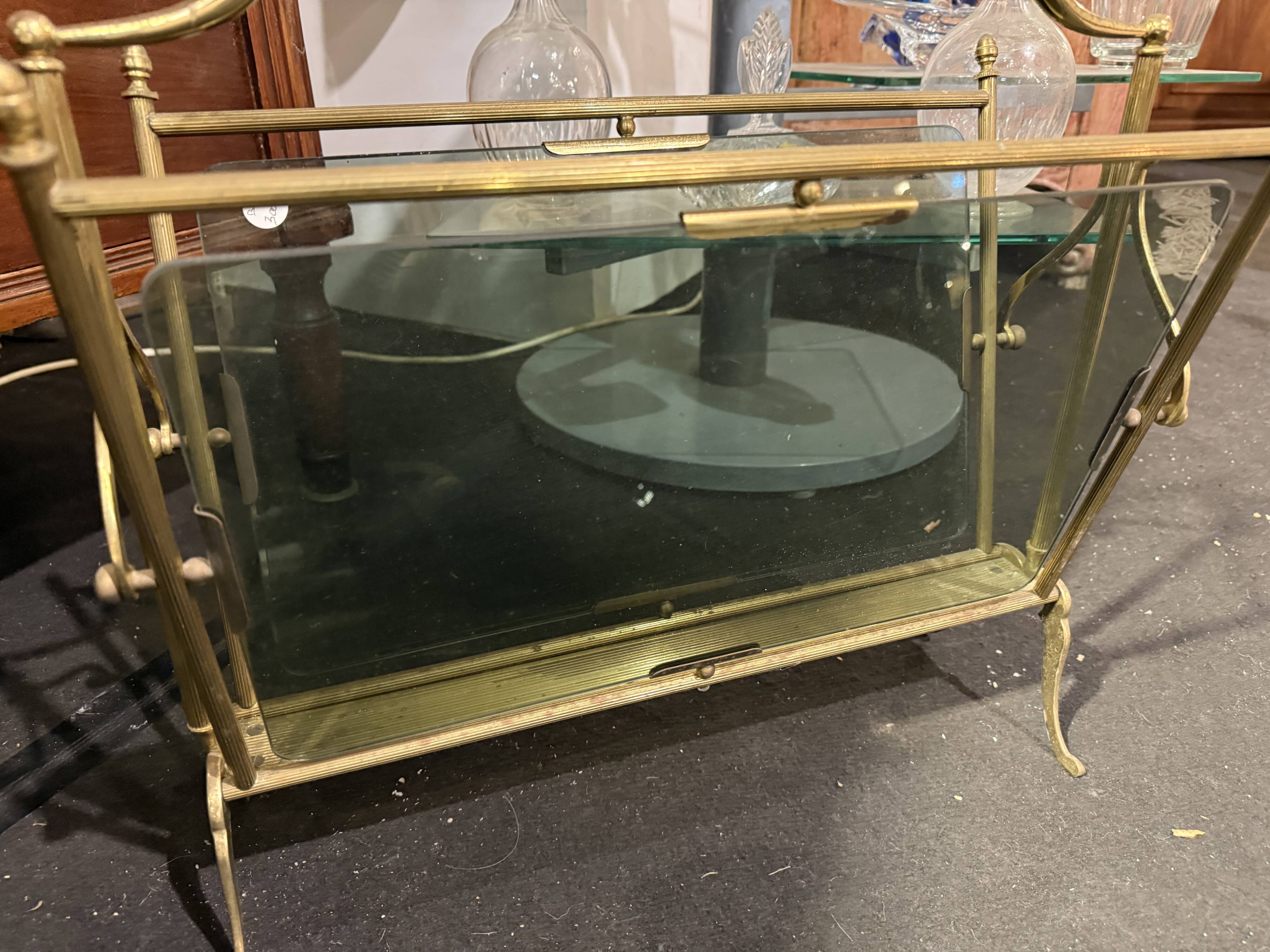 Tinted glass and brass magazine rack