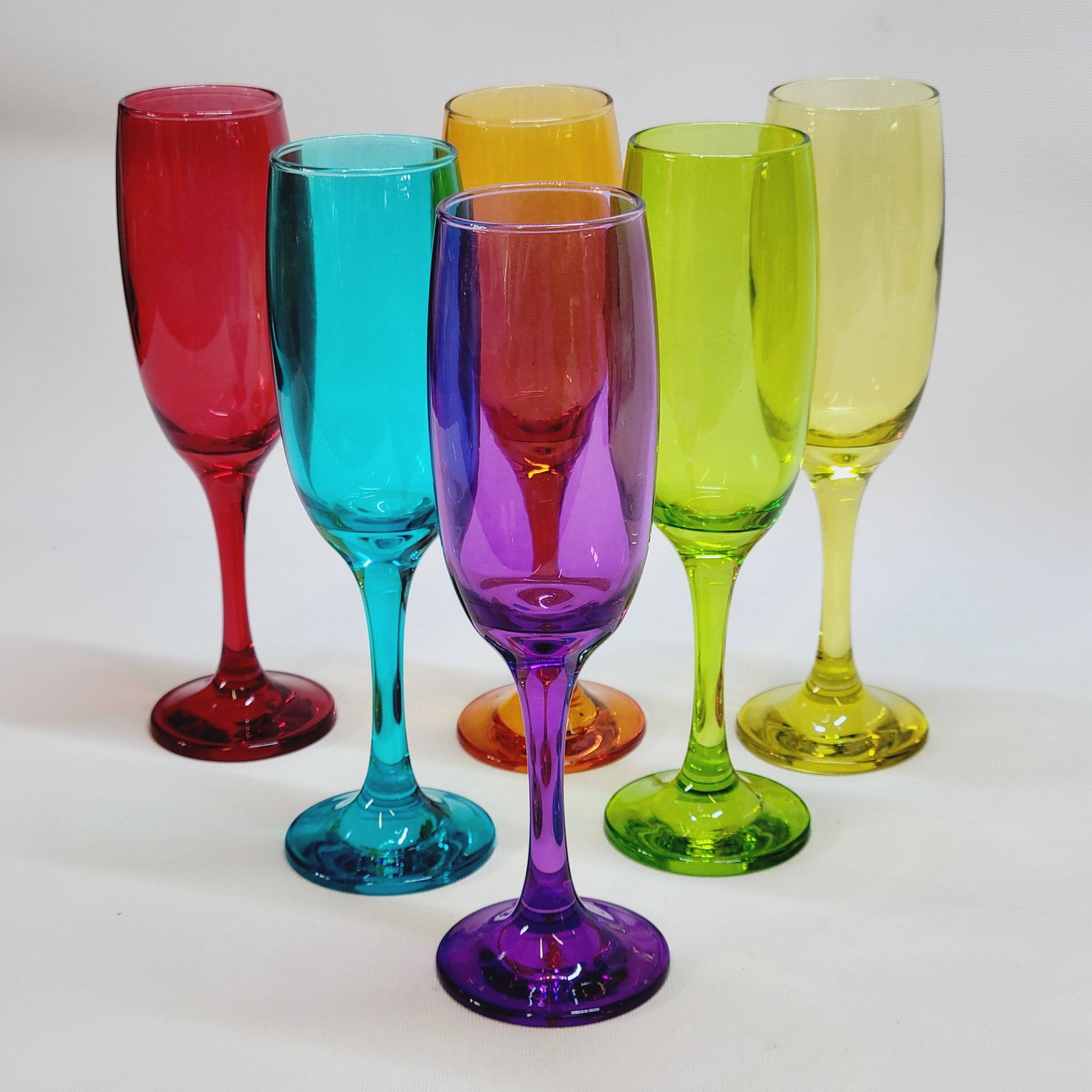 6 multicolored glass champagne flutes red orange yellow green blue purple