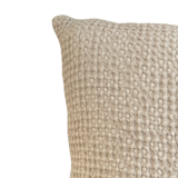 Light beige embossed cushion