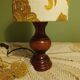 Turned wood lamp with authentic vintage lampshade and mustard flower decoration