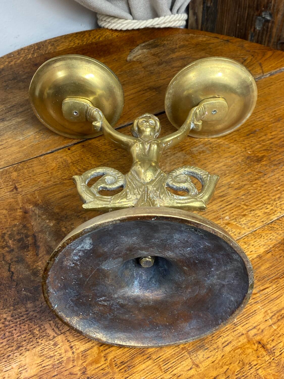 Mermaid-shaped chandelier in bronze