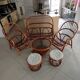 Sofa armchairs and coffee table in vintage rattan of six pieces