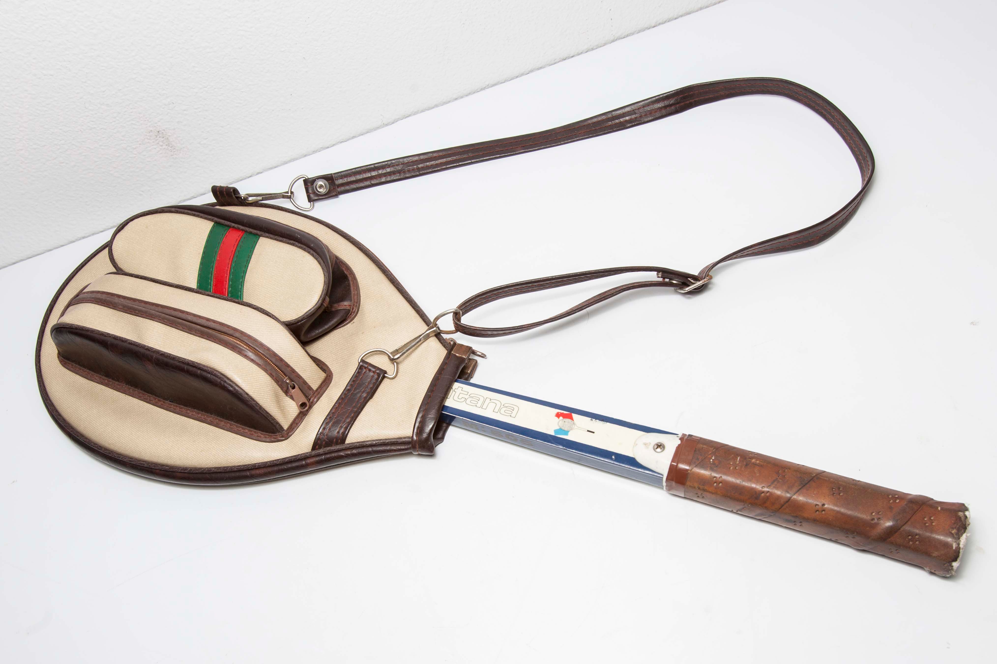 Blue Montana M505 racket with leather bag
