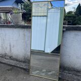 Miroir style vénitien à décor gravé et encadrement doré