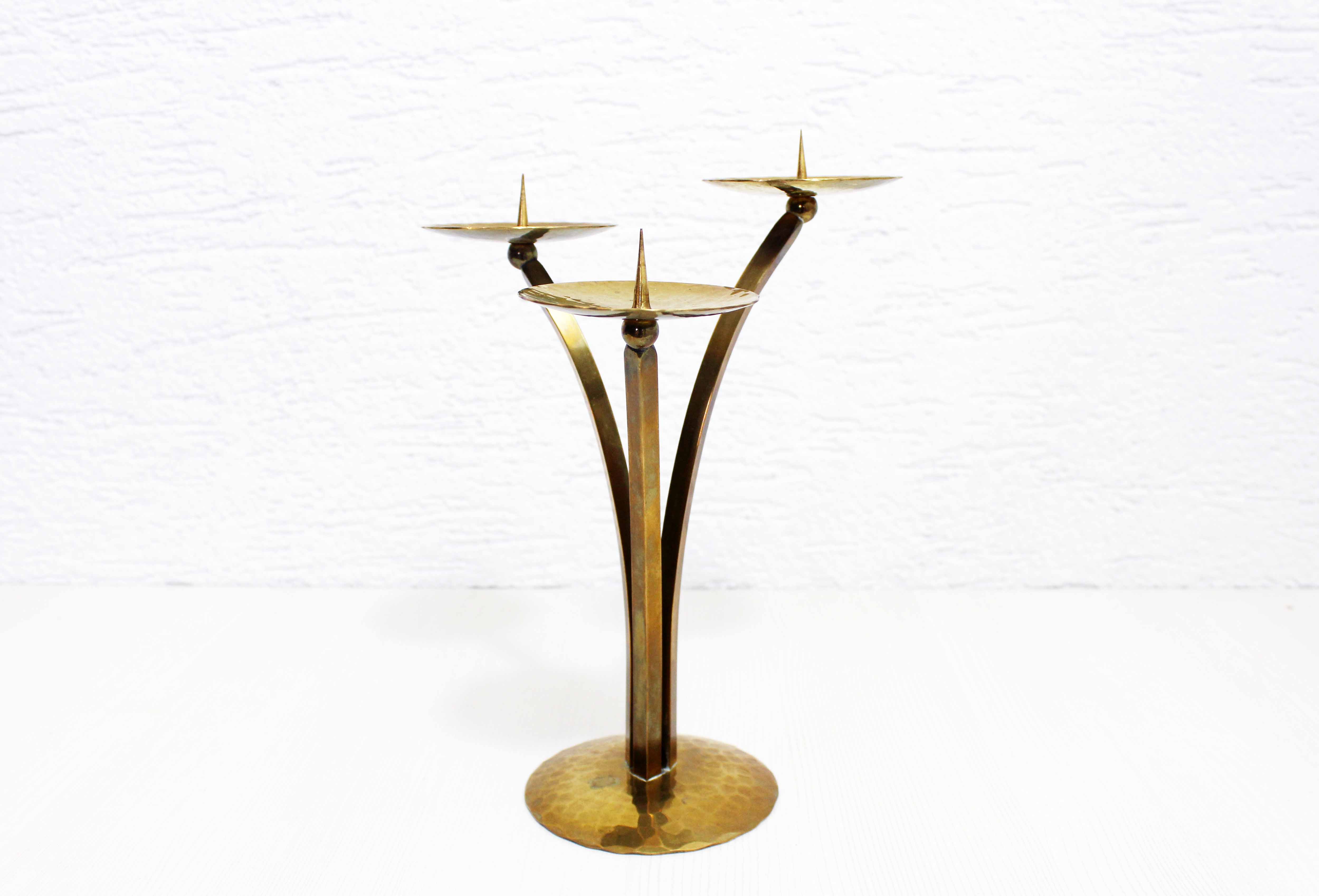 Triple brass candle holder