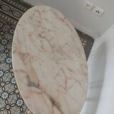 Oval coffee table with marble top