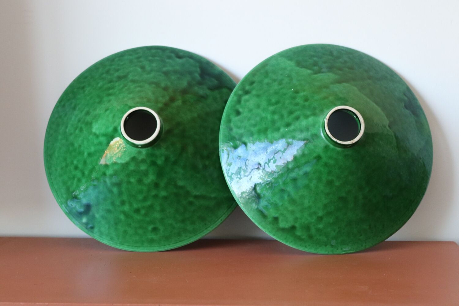 Two vintage green ceramic lampshades