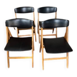Four black vinyl folding chairs, circa 1960, Scandinavian style, very good condition