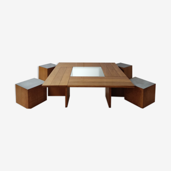 Large wooden Tecno coffee table and 4 stools