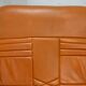 Sofa "space age". Leather, fiberglass, foam, steel. Circa 1970. Orange.