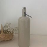 Old enameled stoneware bottle
