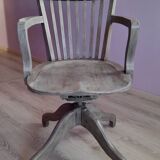 Swivel office chair in gray lacquered wood