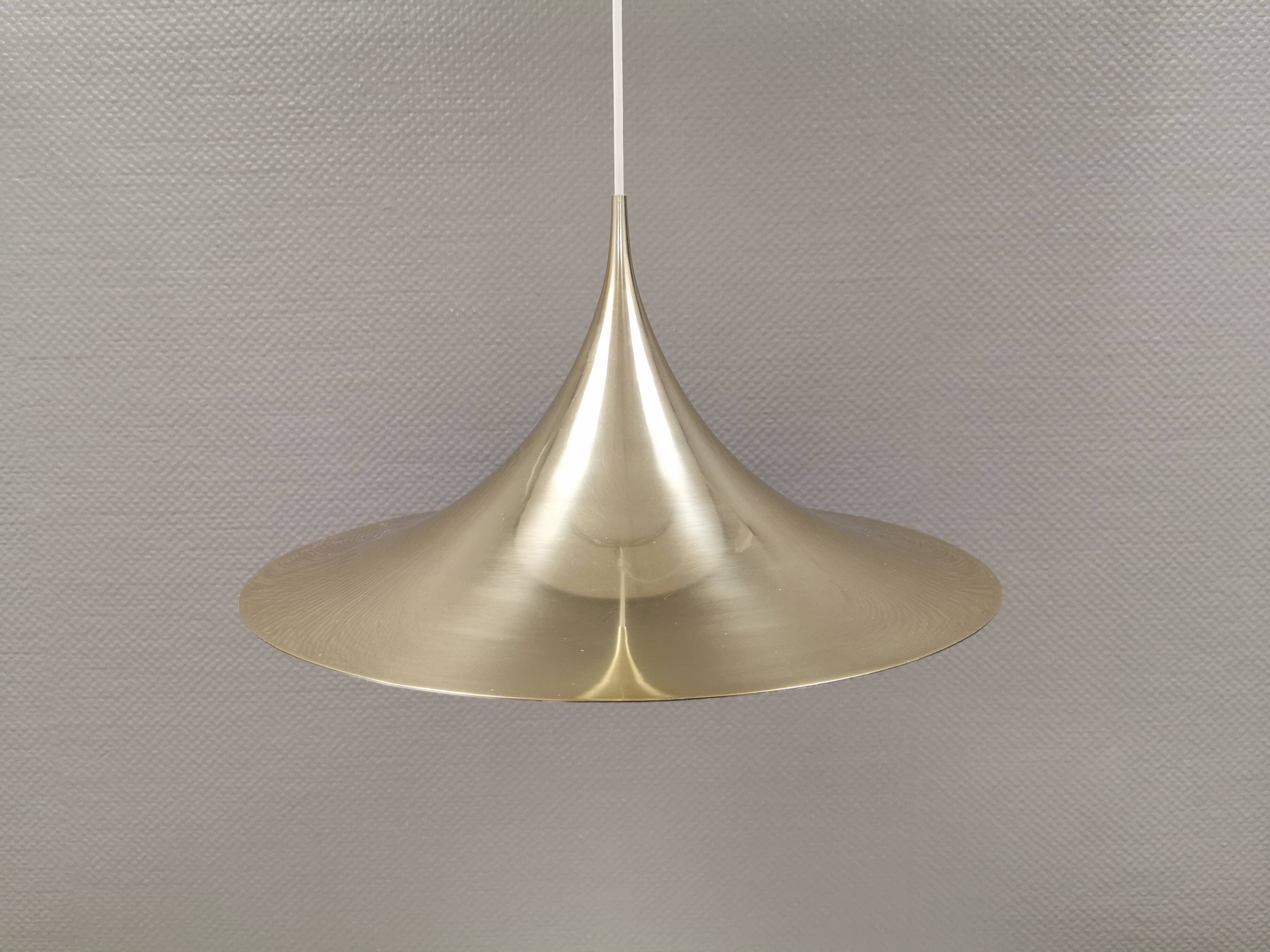 Golden semi hanging lamp, designed by bonderup & thorup Denmak 1974