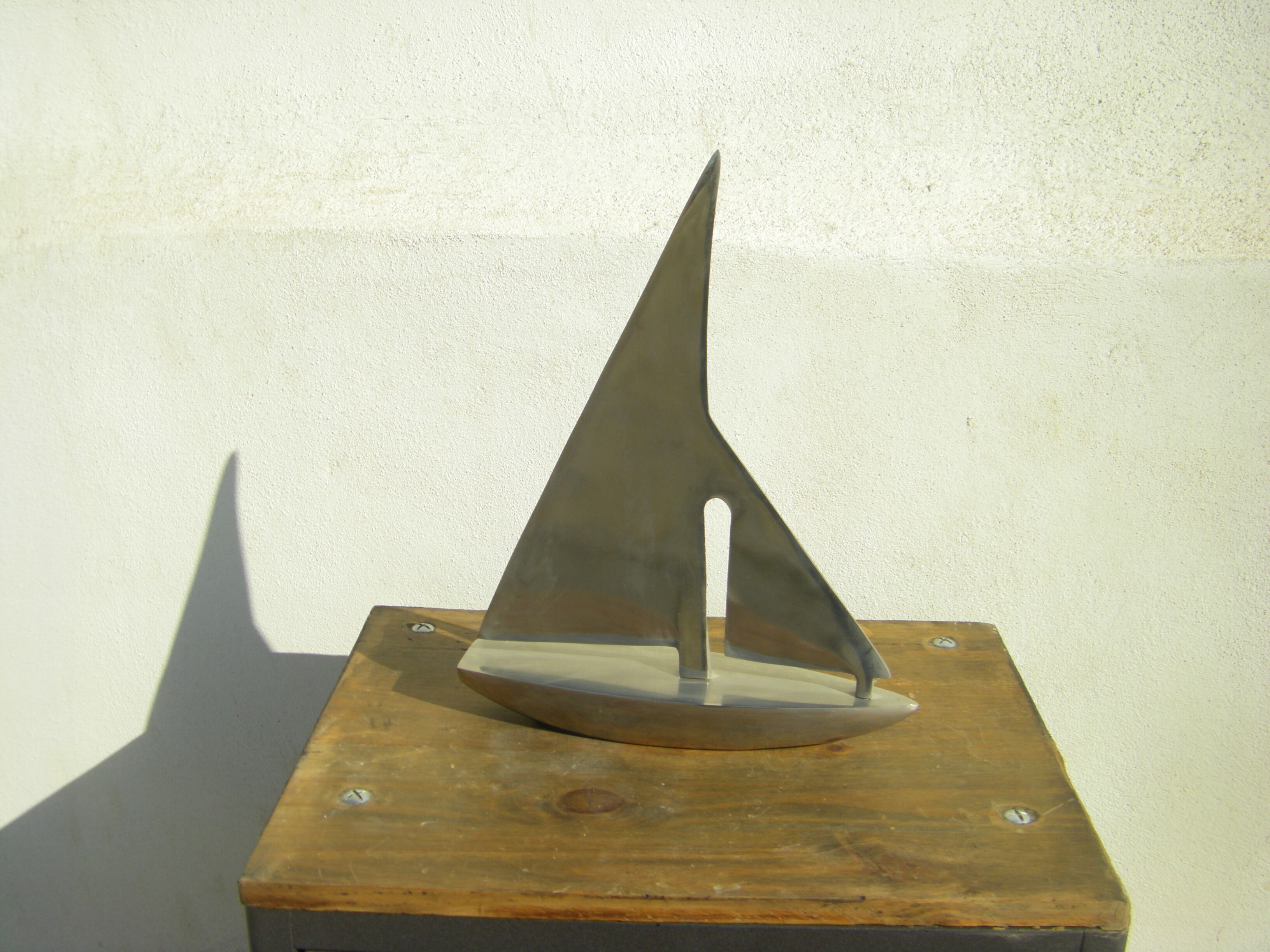 Sailboat brushed aluminum design
