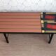 Vintage coffee table in ceramic, wood, and metal.