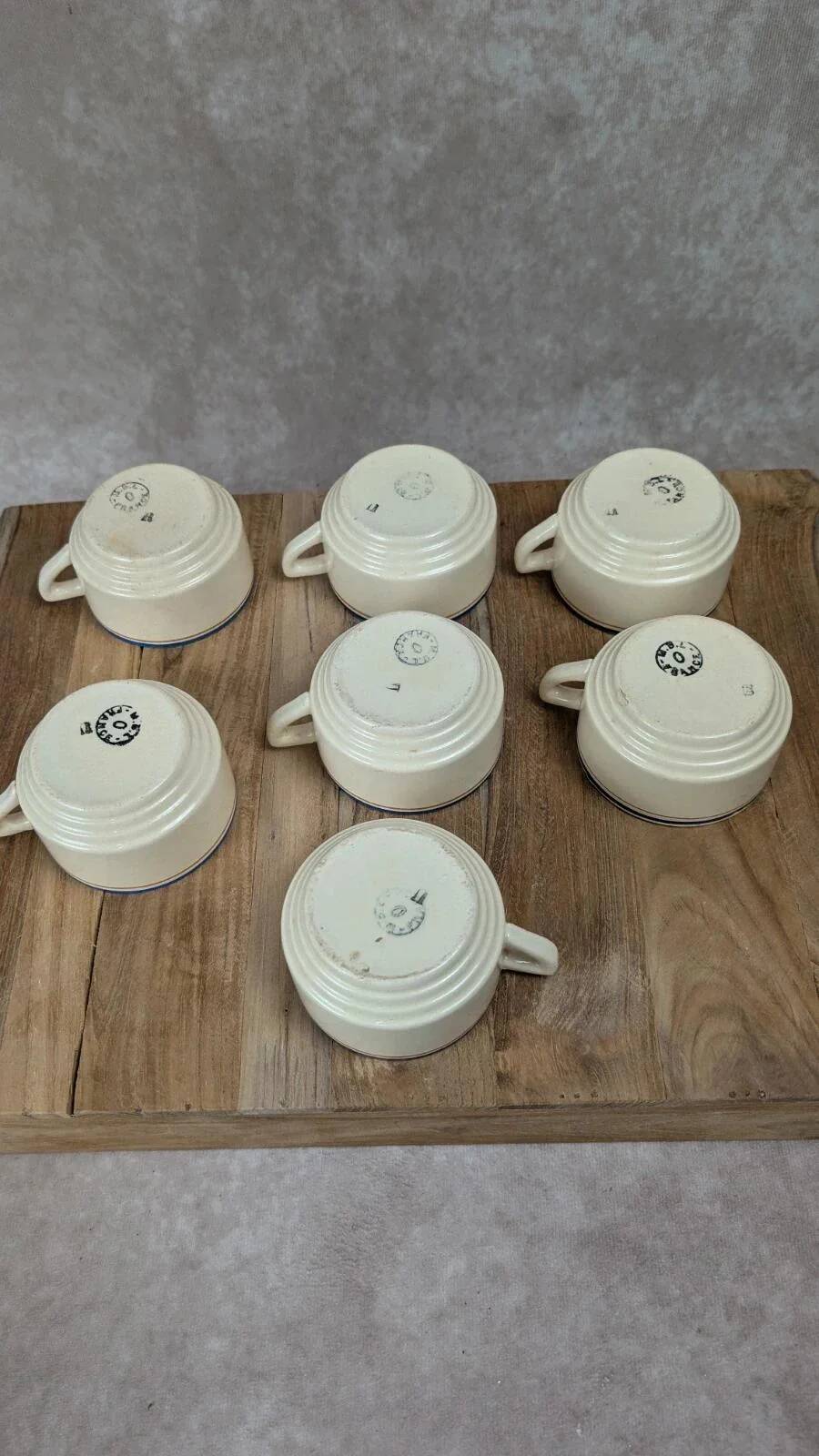 Set of 7 vintage cups Moulin des Loups – Blue and ochre trim, retro charm