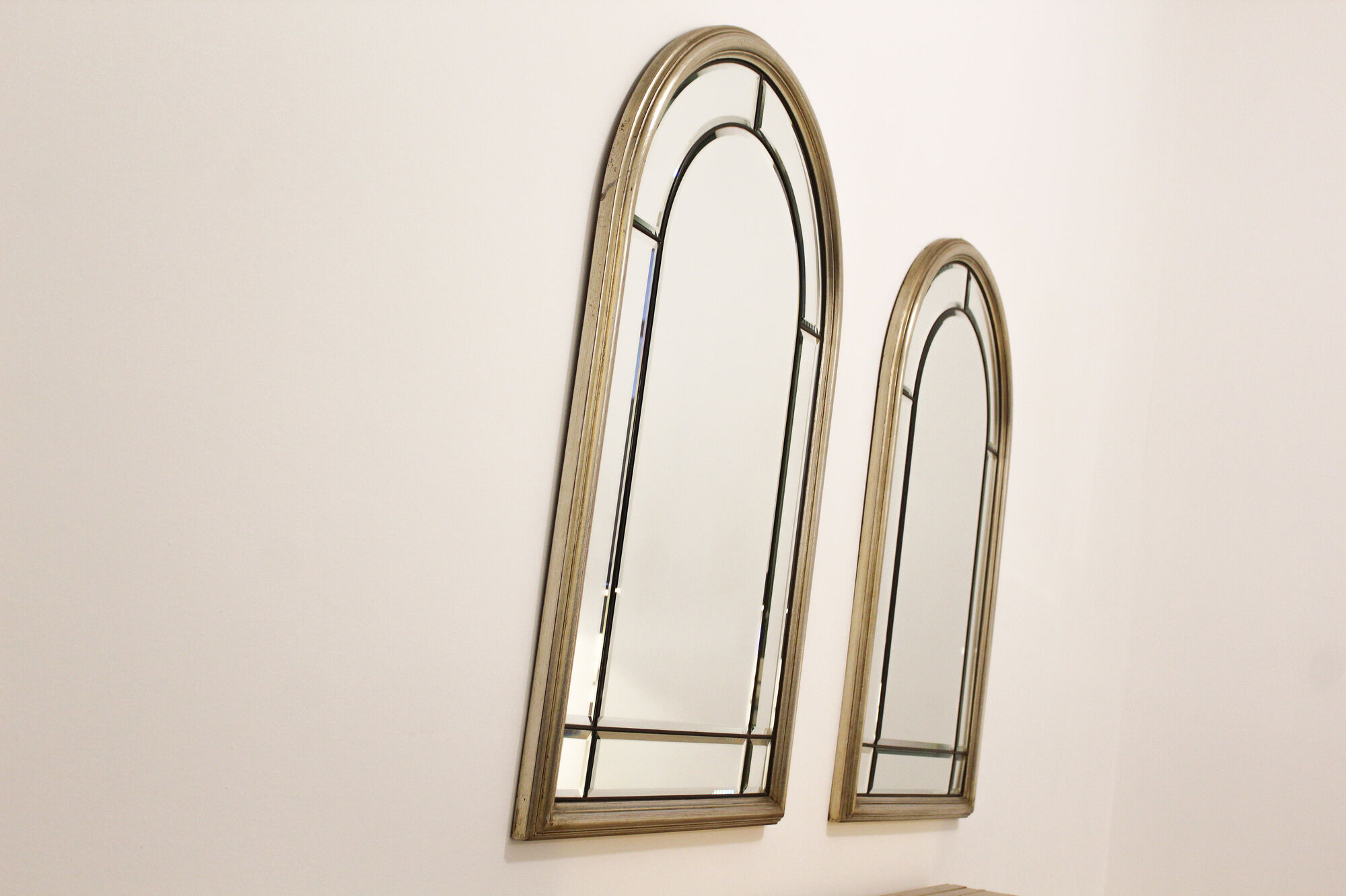 Pair of bevelled mirrors, brass edging frame in brushed wood years Italy 70's