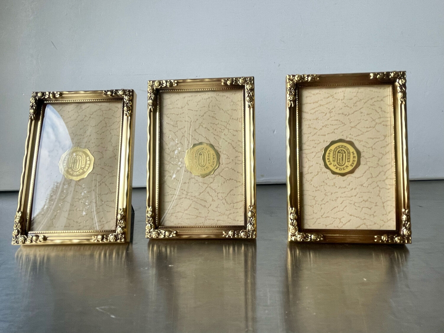 Set of 3 vintage identical gold colored metal picture frames convex glass