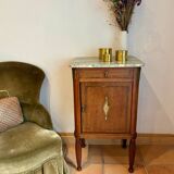 Antique bedside table in wood and marble – adorned with gilded brass ornaments –