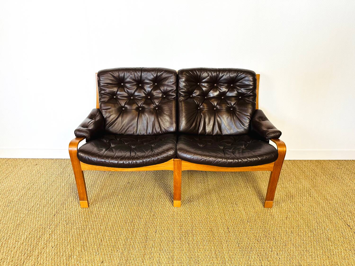 Scandinavian leather and teak bench from the 1960s.