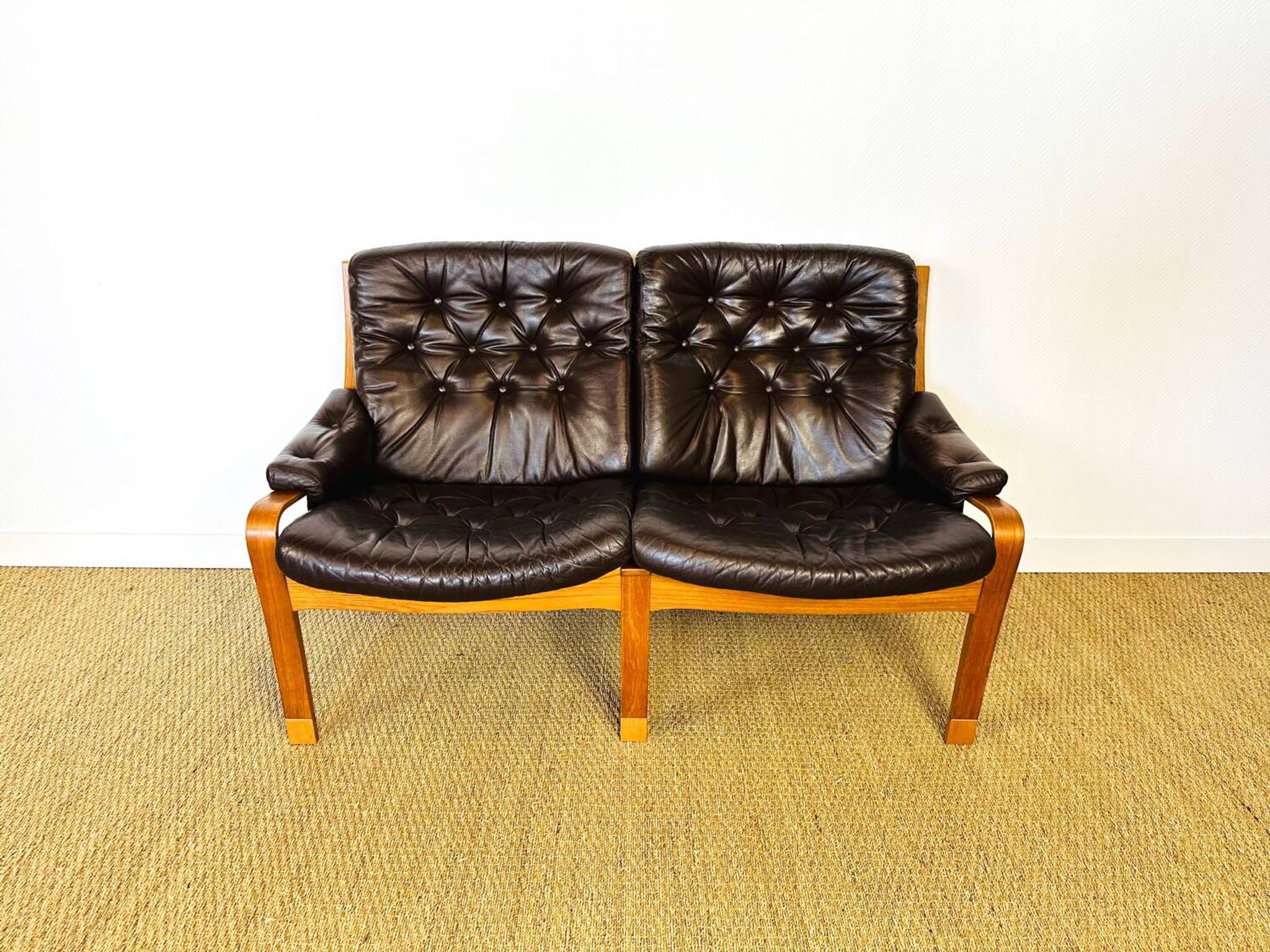 Scandinavian leather and teak bench from the 1960s.