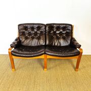 Scandinavian leather and teak bench from the 1960s.