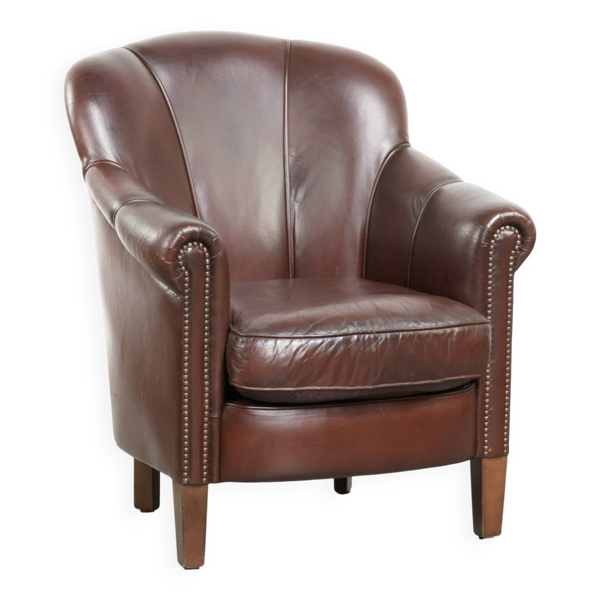 Fauteuil en peau de mouton charmant avec de belles couleurs et de jolis détails.
