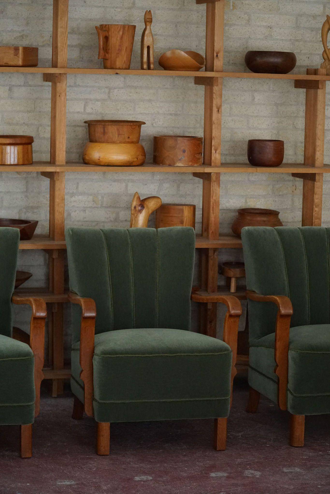 Danish Art Deco, set of 3 oak armchairs, reupholstered in green mohair, 1930s.