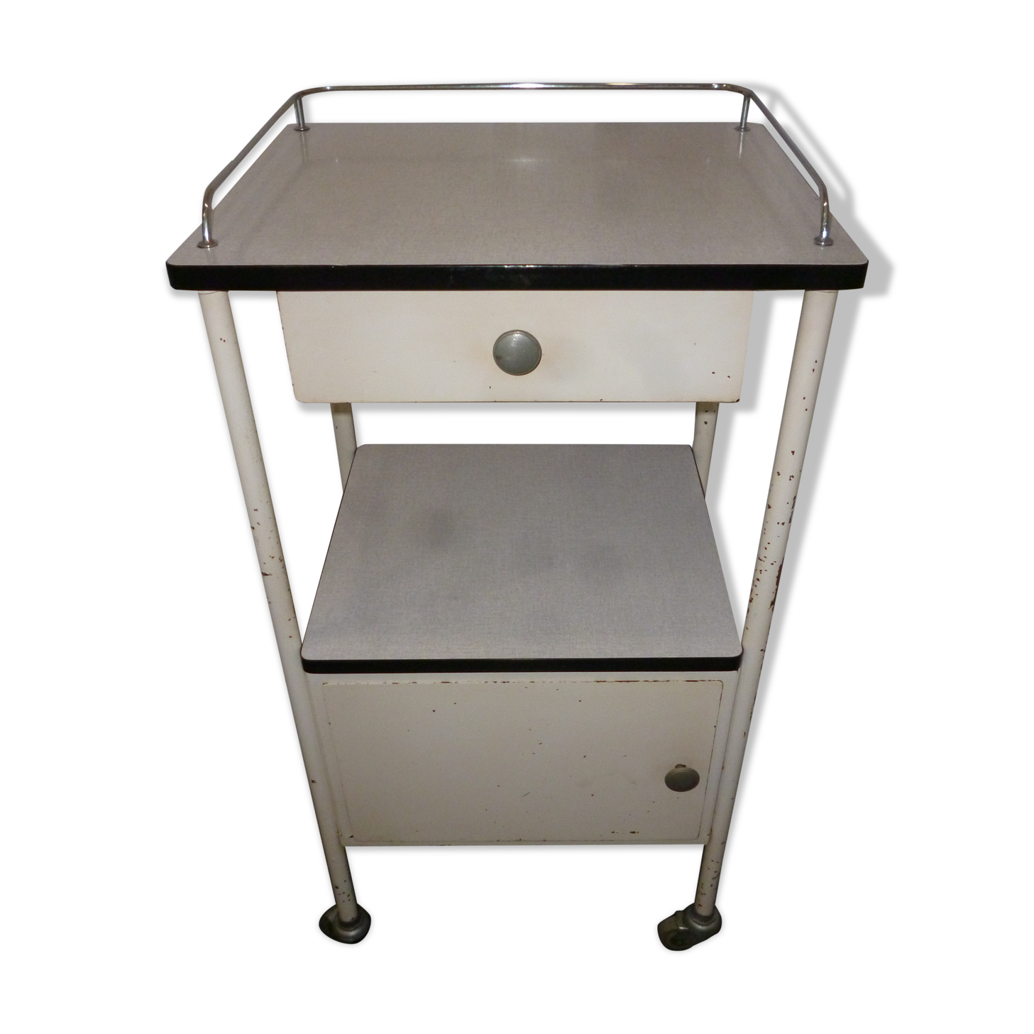 Old bedside on wheels