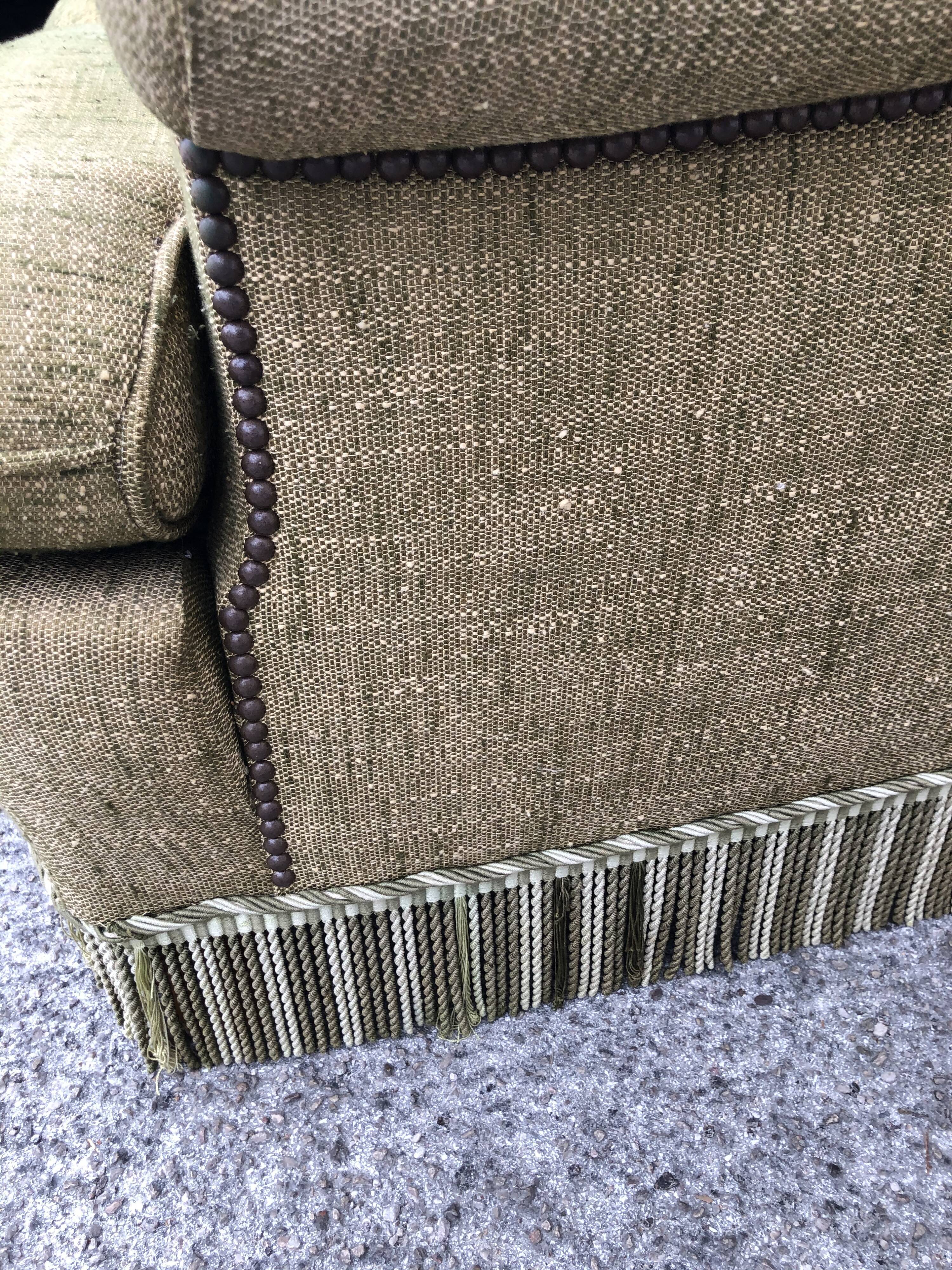 Paire de fauteuils seventies en tweed vert