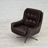 1970s, set of two swivel lounge chairs with footstool, leather.