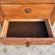 Small workshop cabinet with four drawers, mahogany finish and lined interiors.