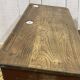 Early 20th-century oak school desk with porcelain inkwells