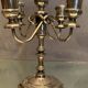 Regency-style 4-spoke metal chandelier with silver patina