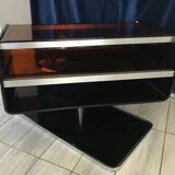 Swivel TV unit in smoked plexiglass