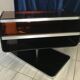 Meuble de TV pivotant en plexiglas fumé