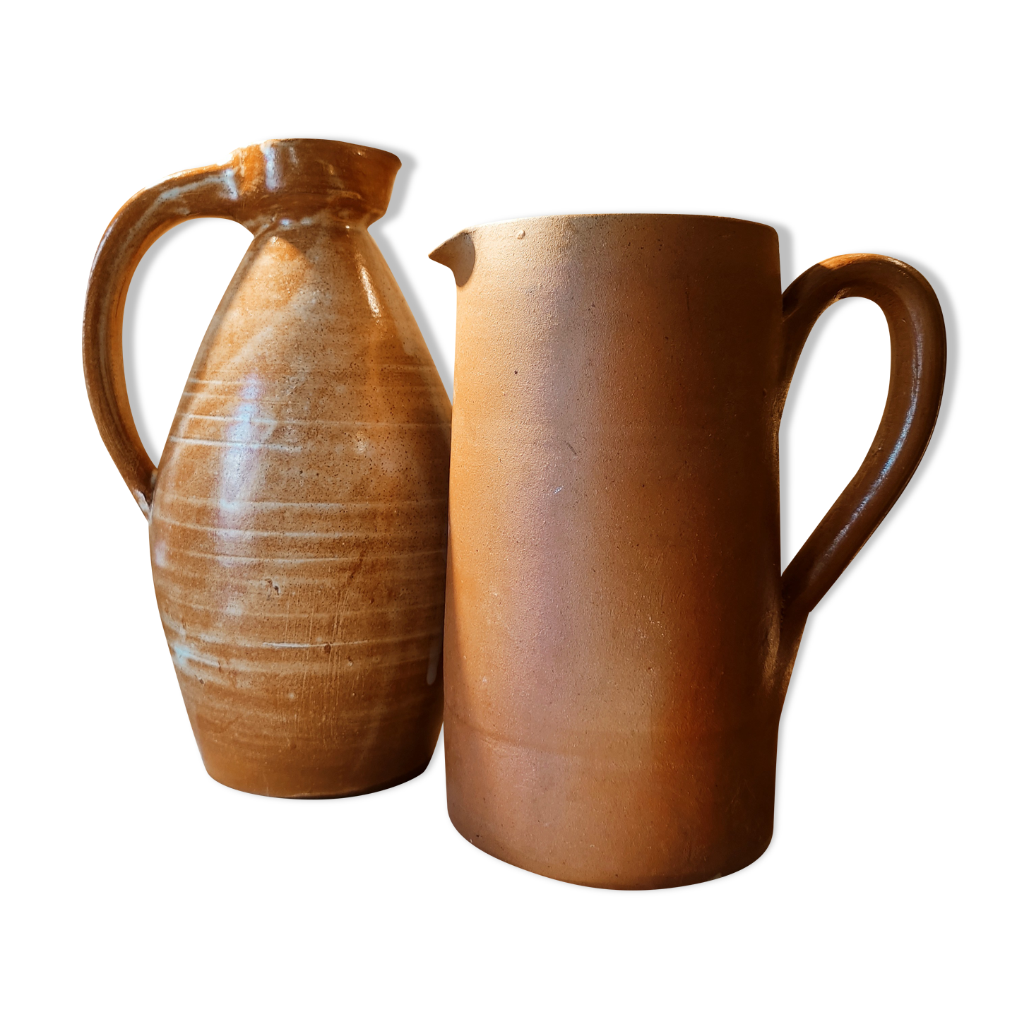 Duo of pitchers water, wine