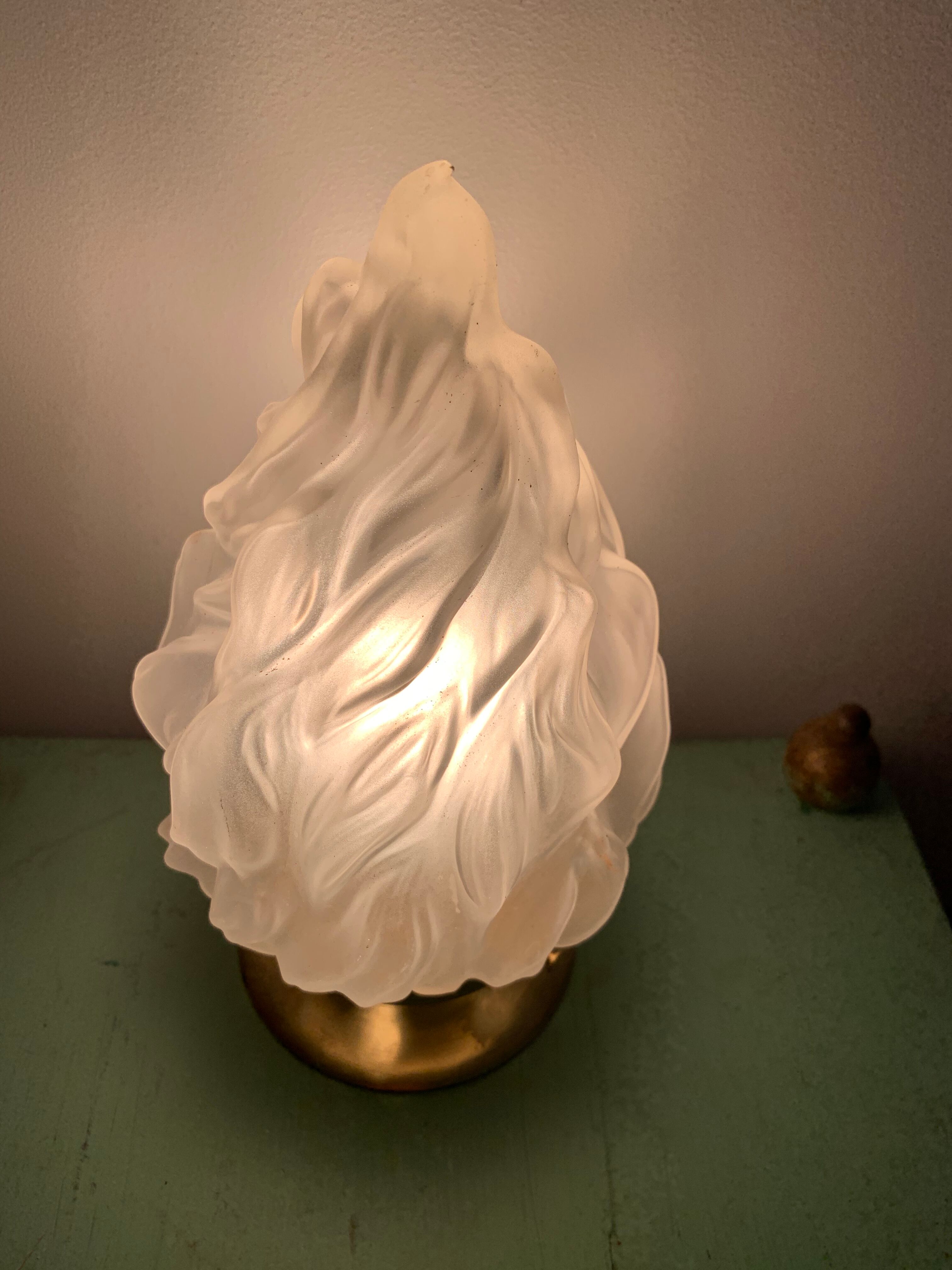 Old laying flame lamp