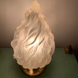Old laying flame lamp
