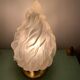 Old laying flame lamp