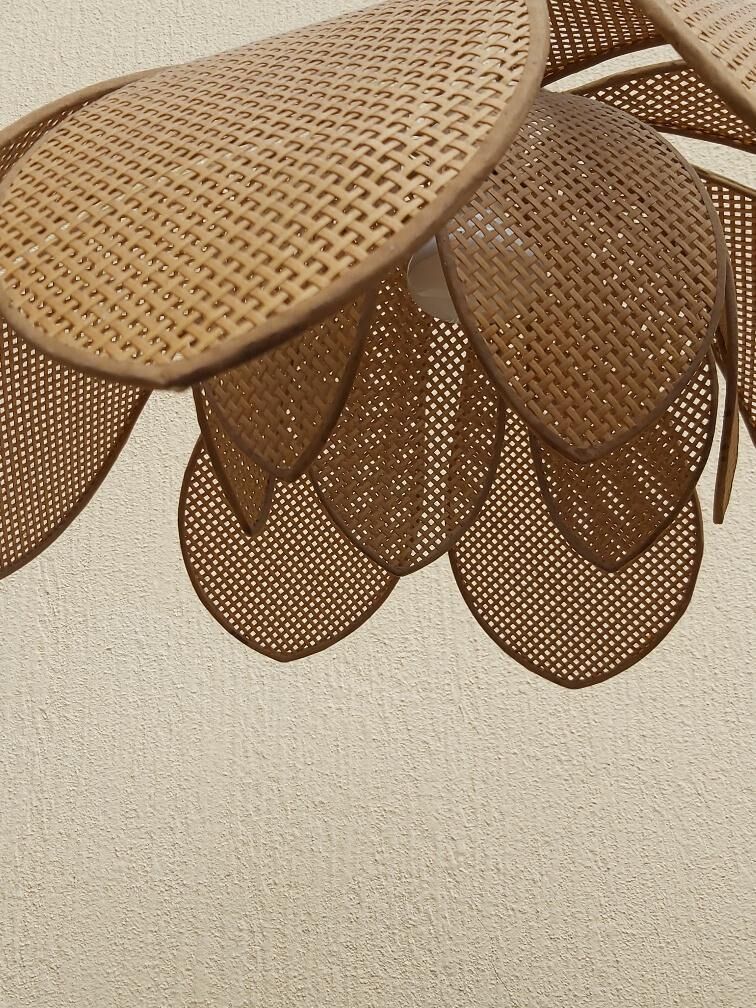 Lotus flower suspension in vintage cannage